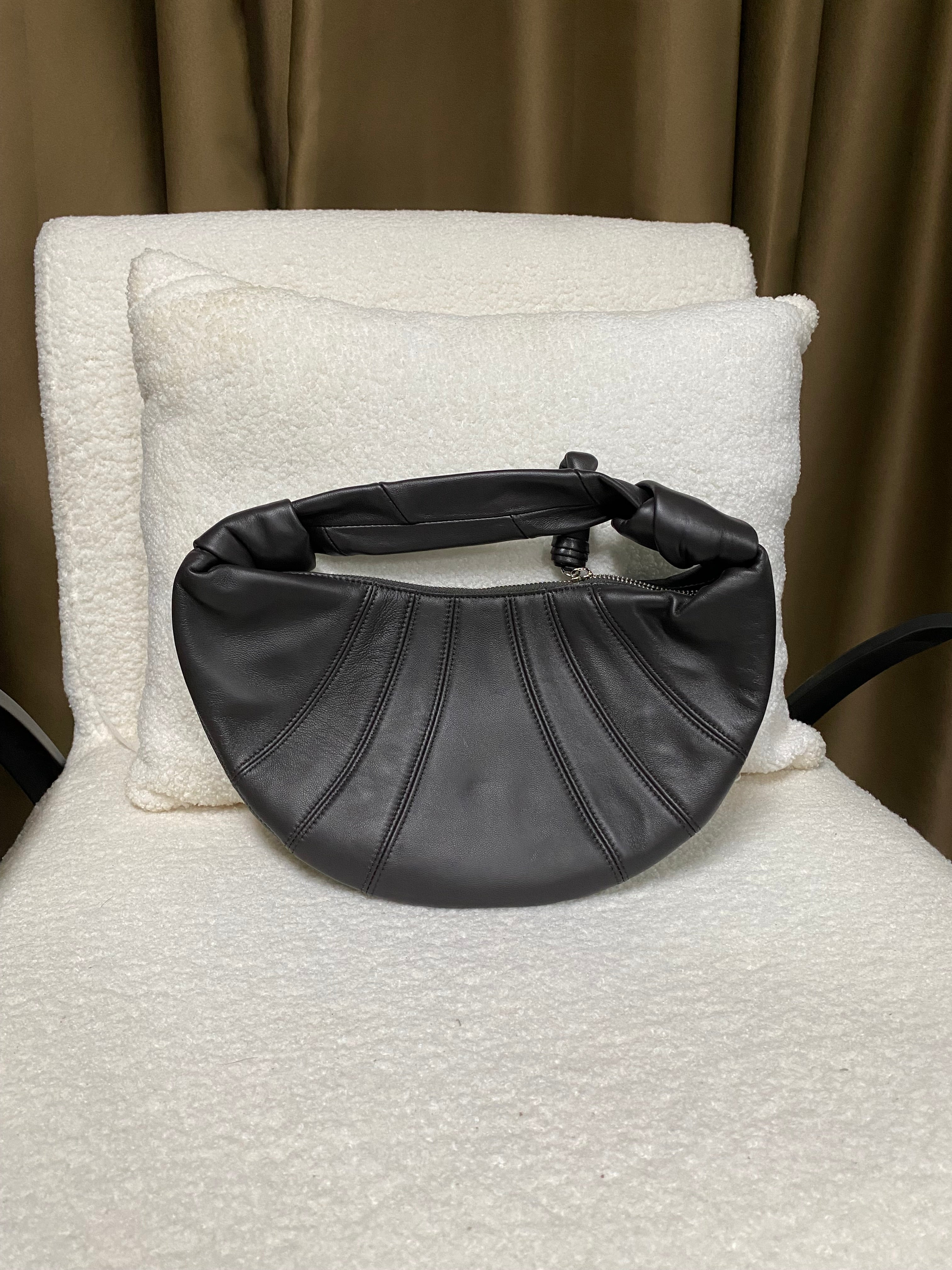 Soft lambskin croissant hobo bag with a padded handle