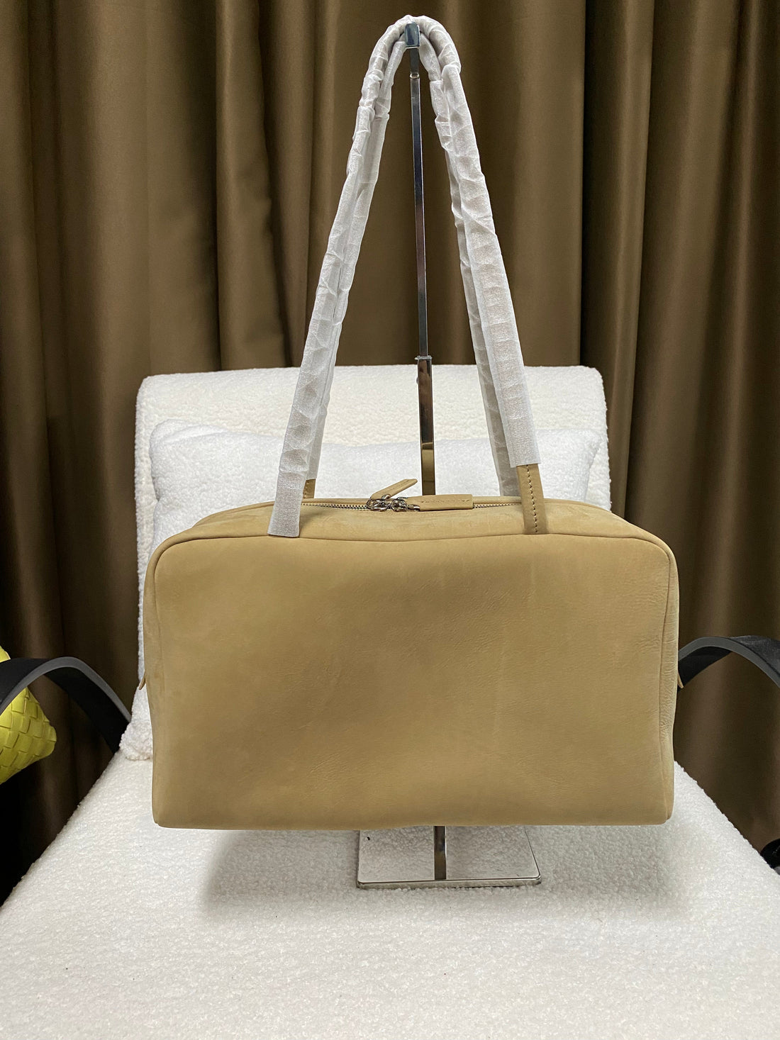 Logo-free leather handbag styled for an understated old money look