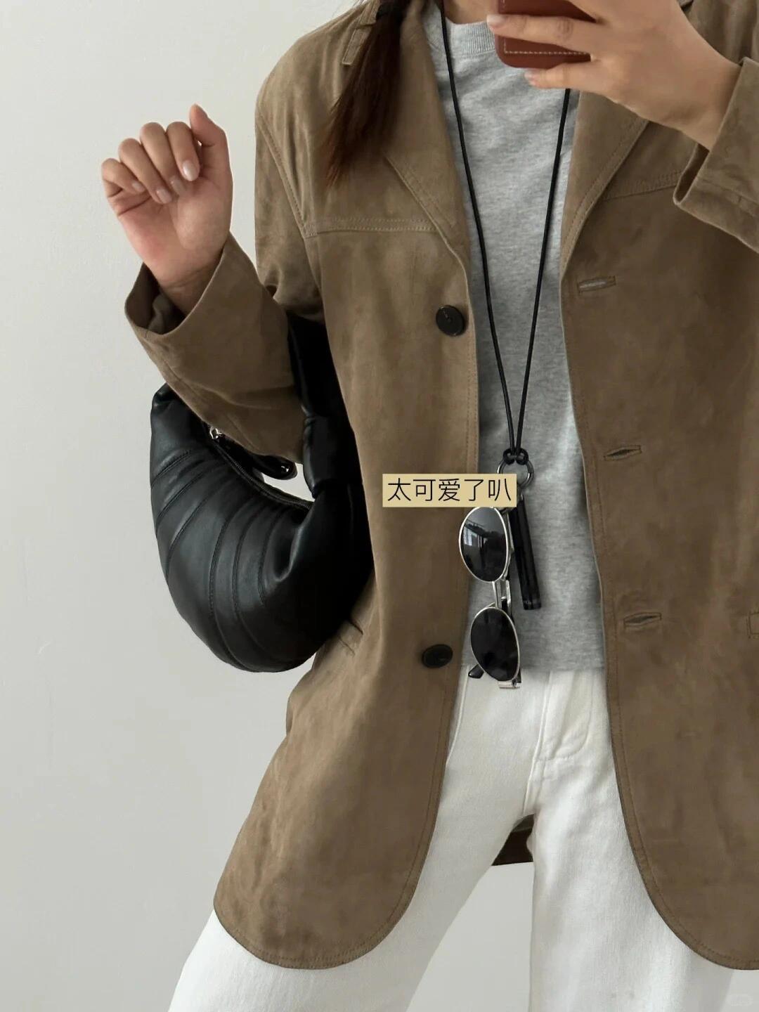 Minimalist leather croissant bag quiet luxury