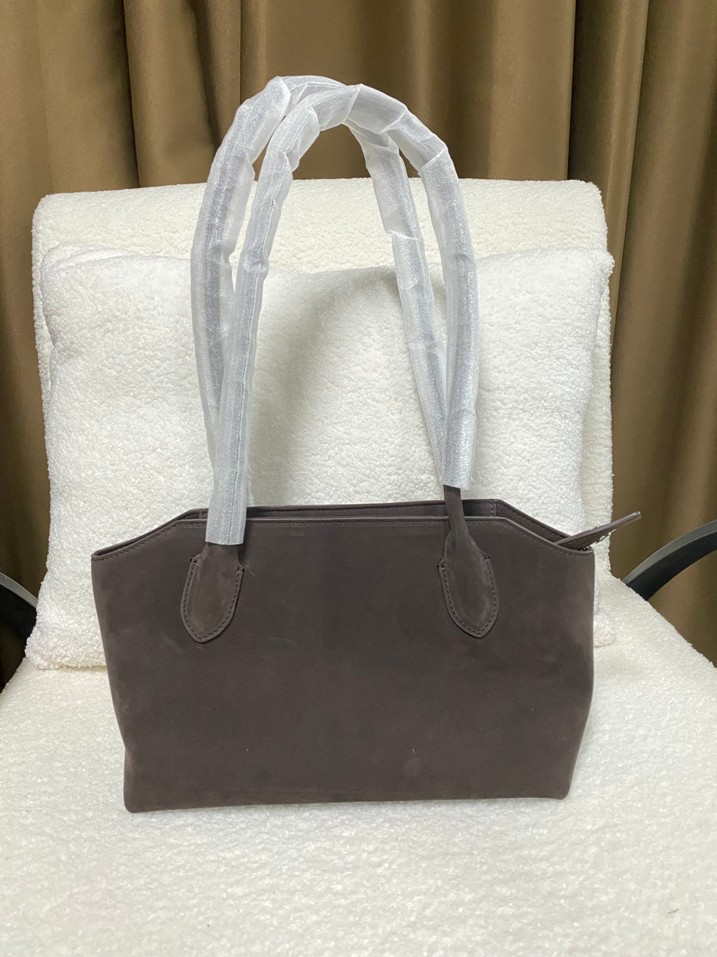 Dark brown calfskin tote bag front view with double handles
