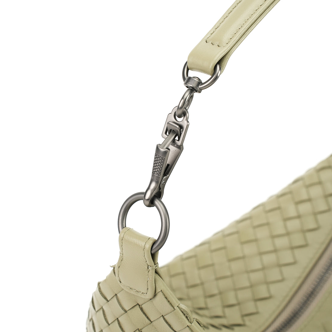 Logo-free handwoven lambskin shoulder bag — butter cream strap clasp close-up