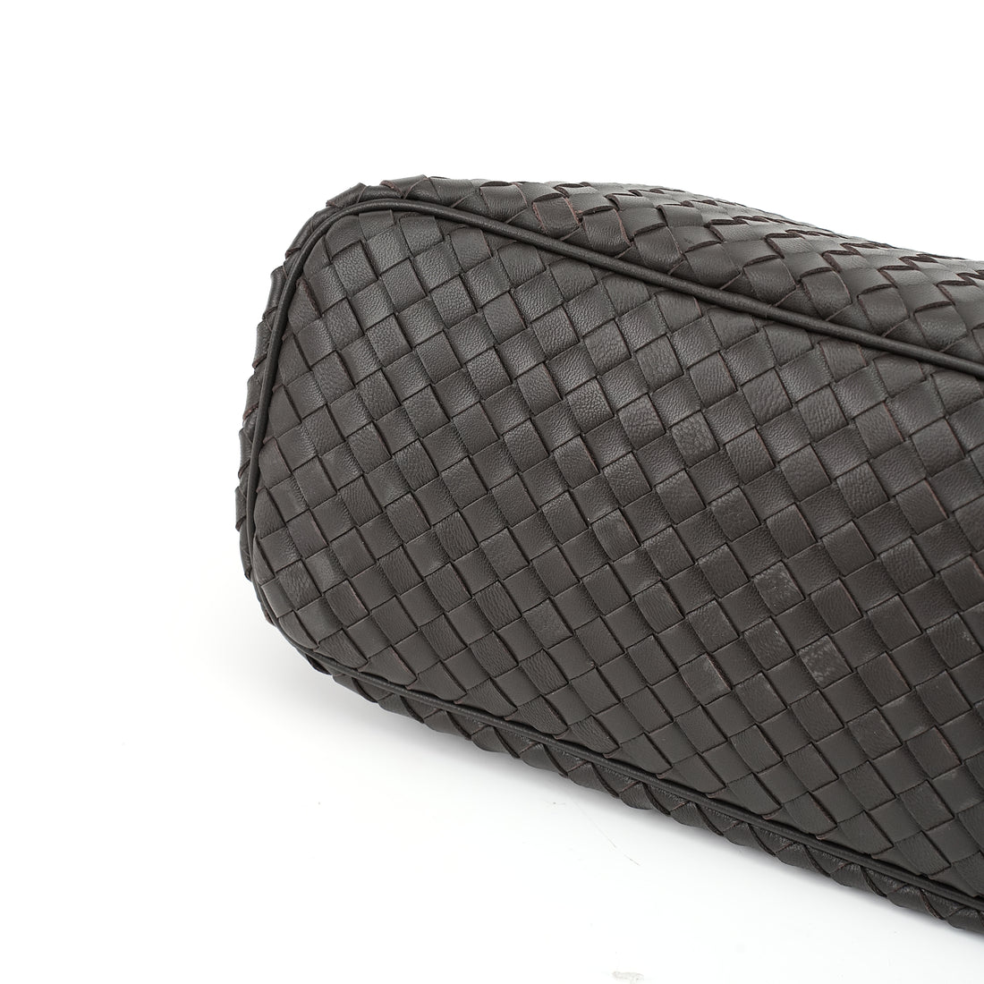 Logo-free handwoven lambskin shoulder bag — black woven leather base view