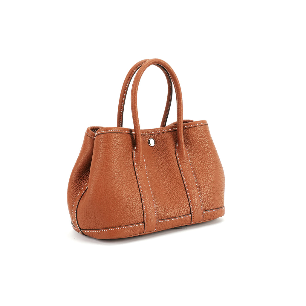 Cognac wide-top leather tote three-quarter view