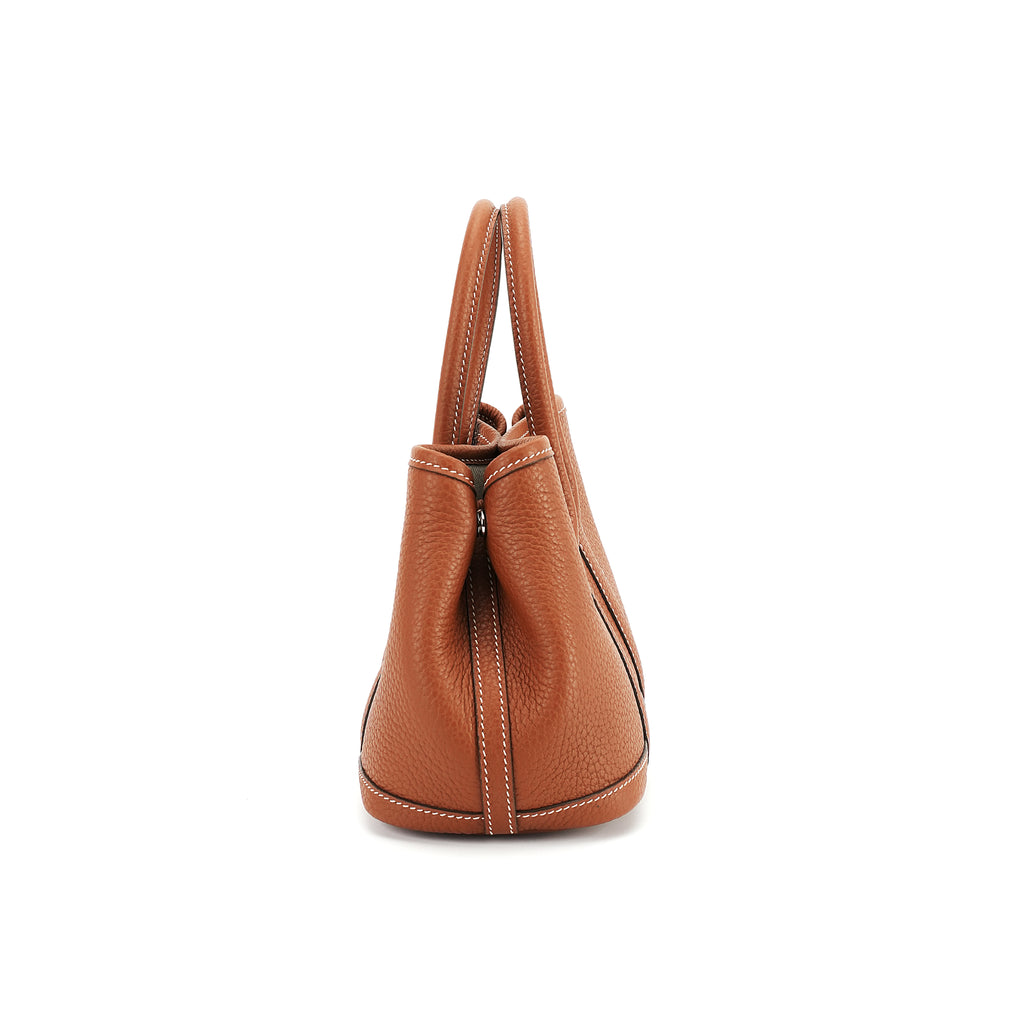 Cognac structured leather tote side profile