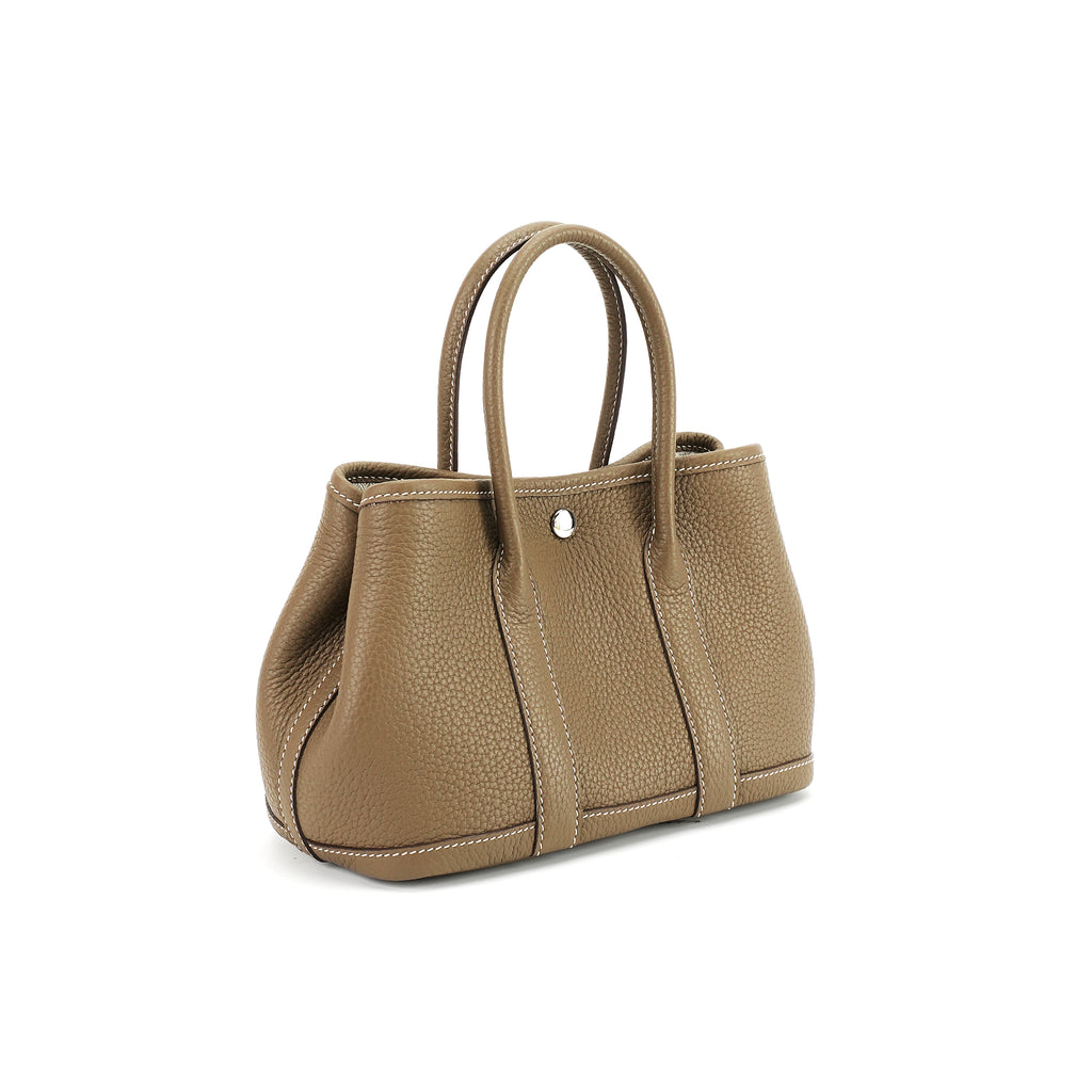 Taupe brown wide-top leather tote three-quarter view