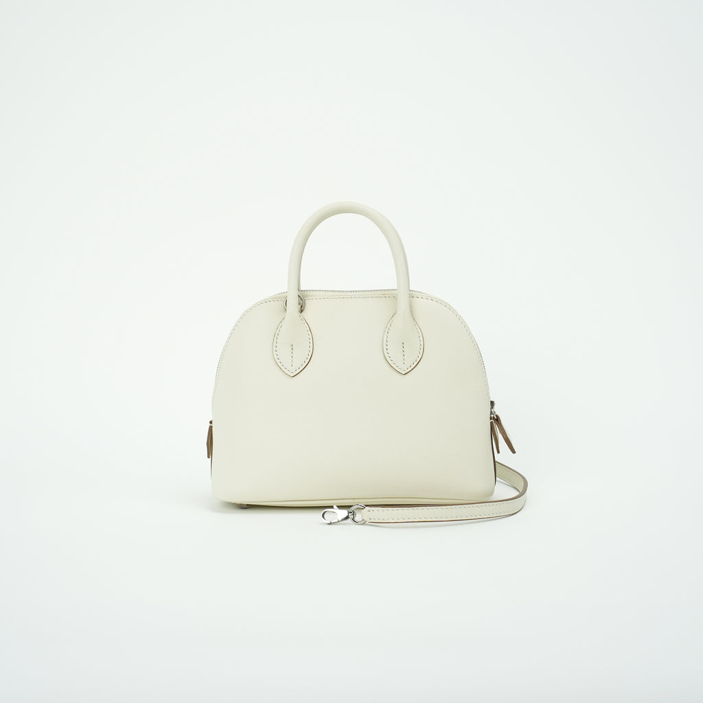 Cream top-grain leather dome handbag with silver-tone crossbody strap