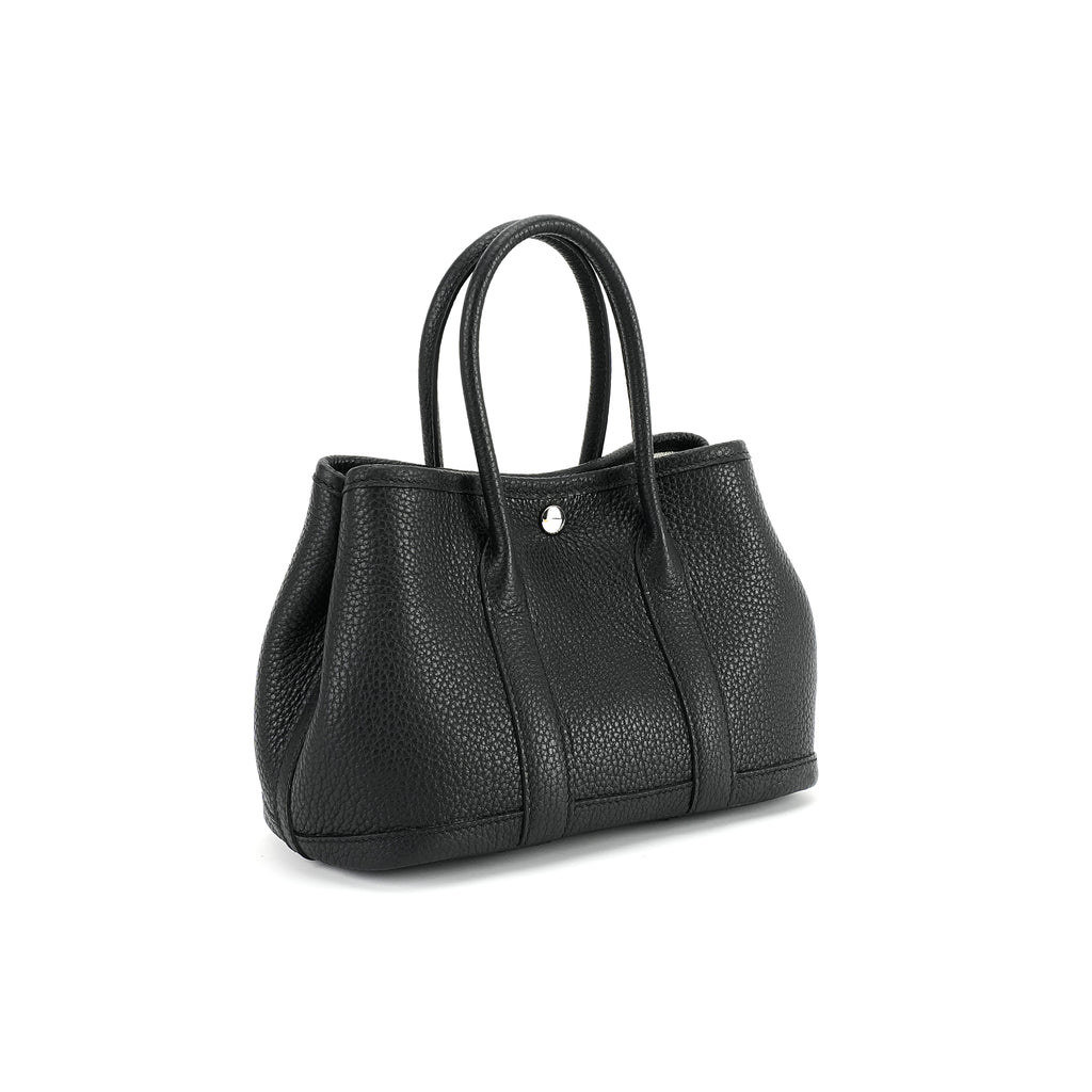 Black wide-top leather tote three-quarter view