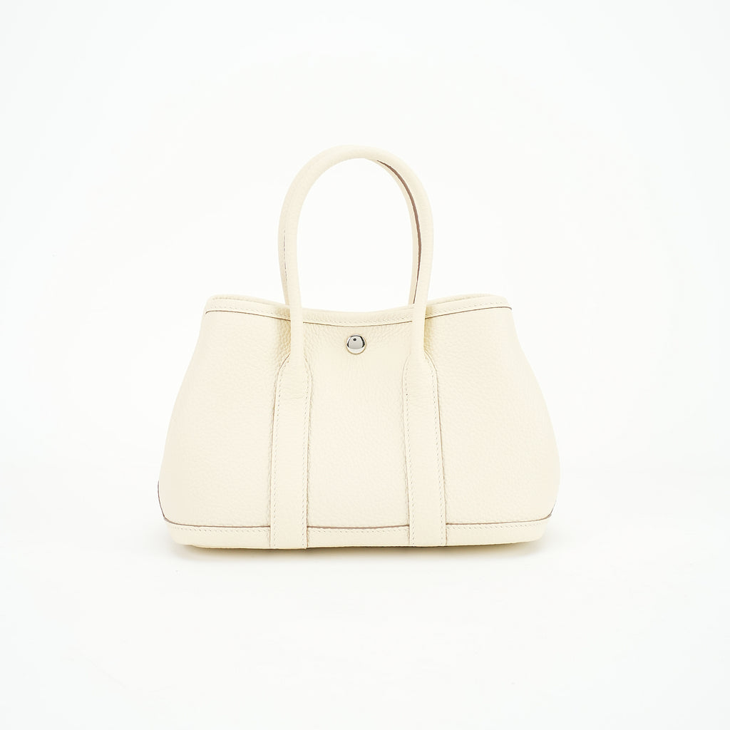 Cream pebbled top-grain leather snap tote front view