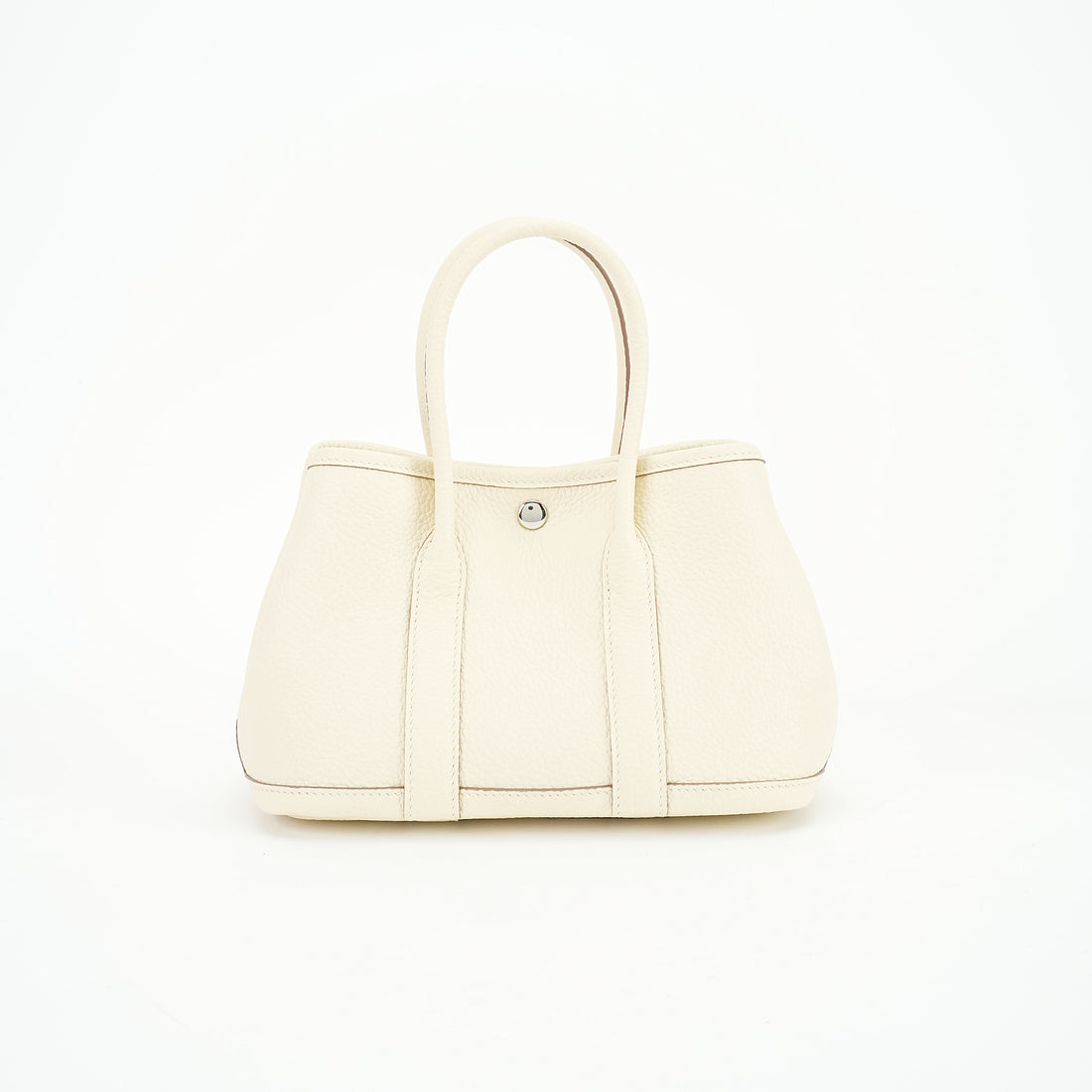Cream pebbled top-grain leather snap tote front view