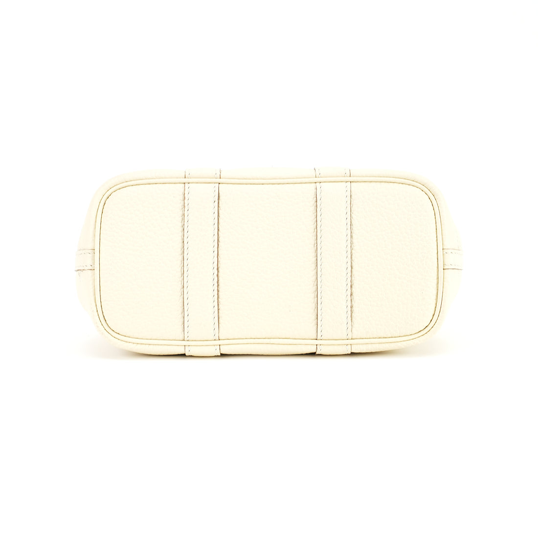 Flat reinforced base of cream leather snap tote