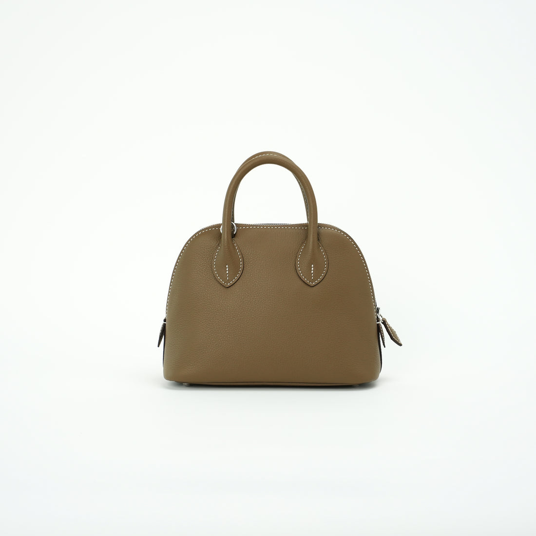 Taupe brown dome leather handbag front view without shoulder strap