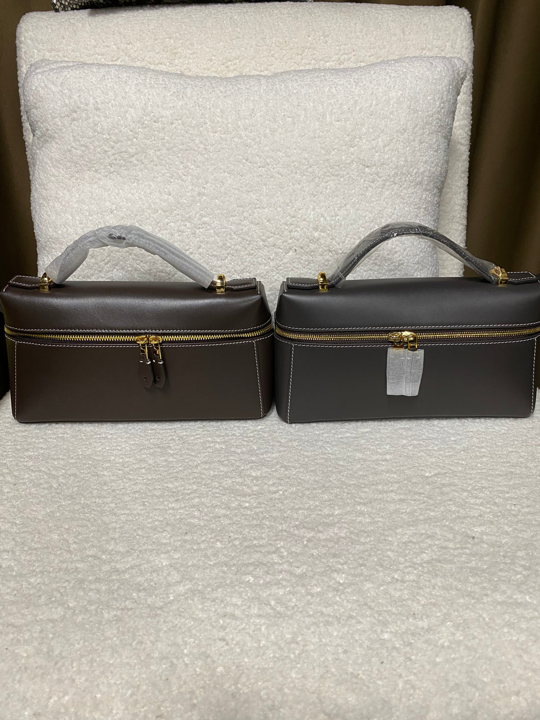 Dark brown calfskin box bag shown from front and back