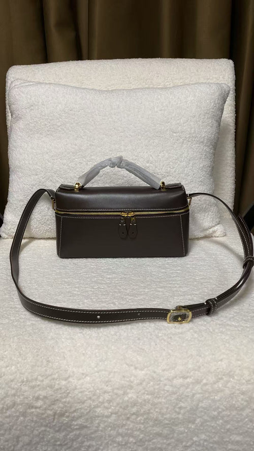 Dark brown calfskin crossbody box bag shown from the front