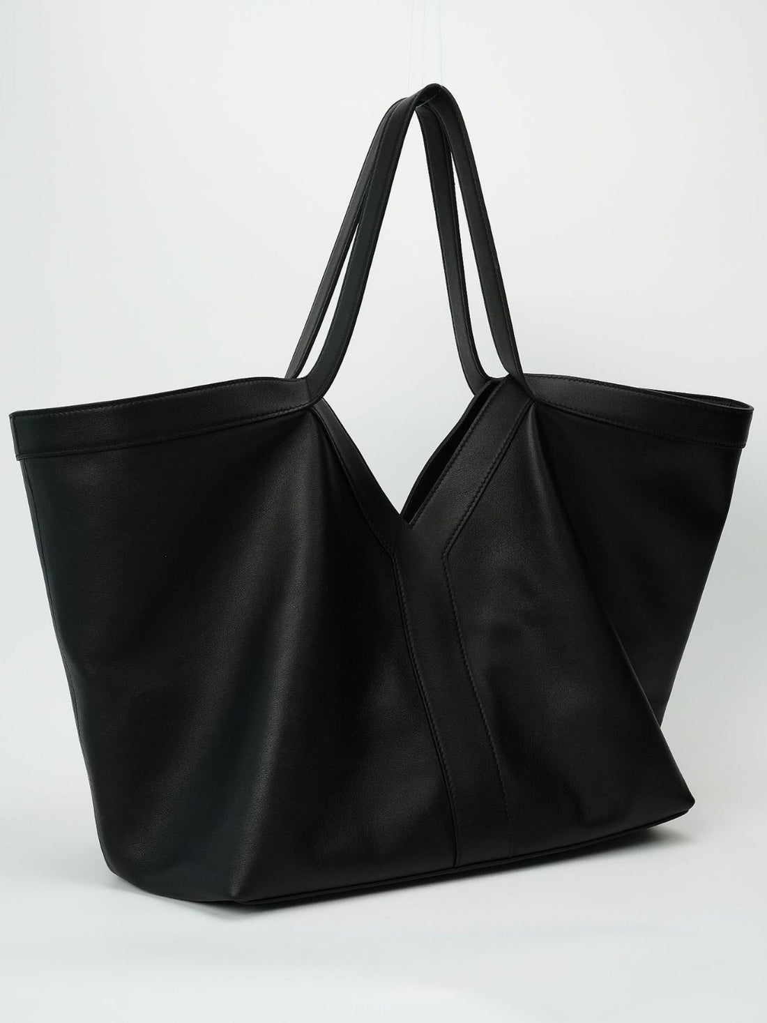 Elegant minimalist black leather tote bag