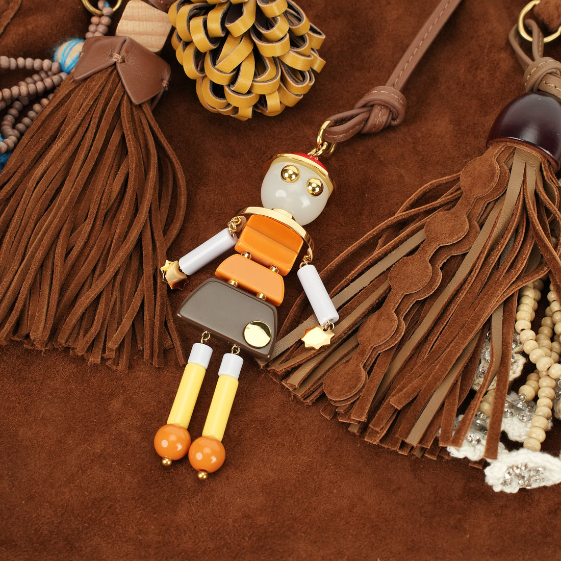 Handcrafted leather shoulder tote with charms