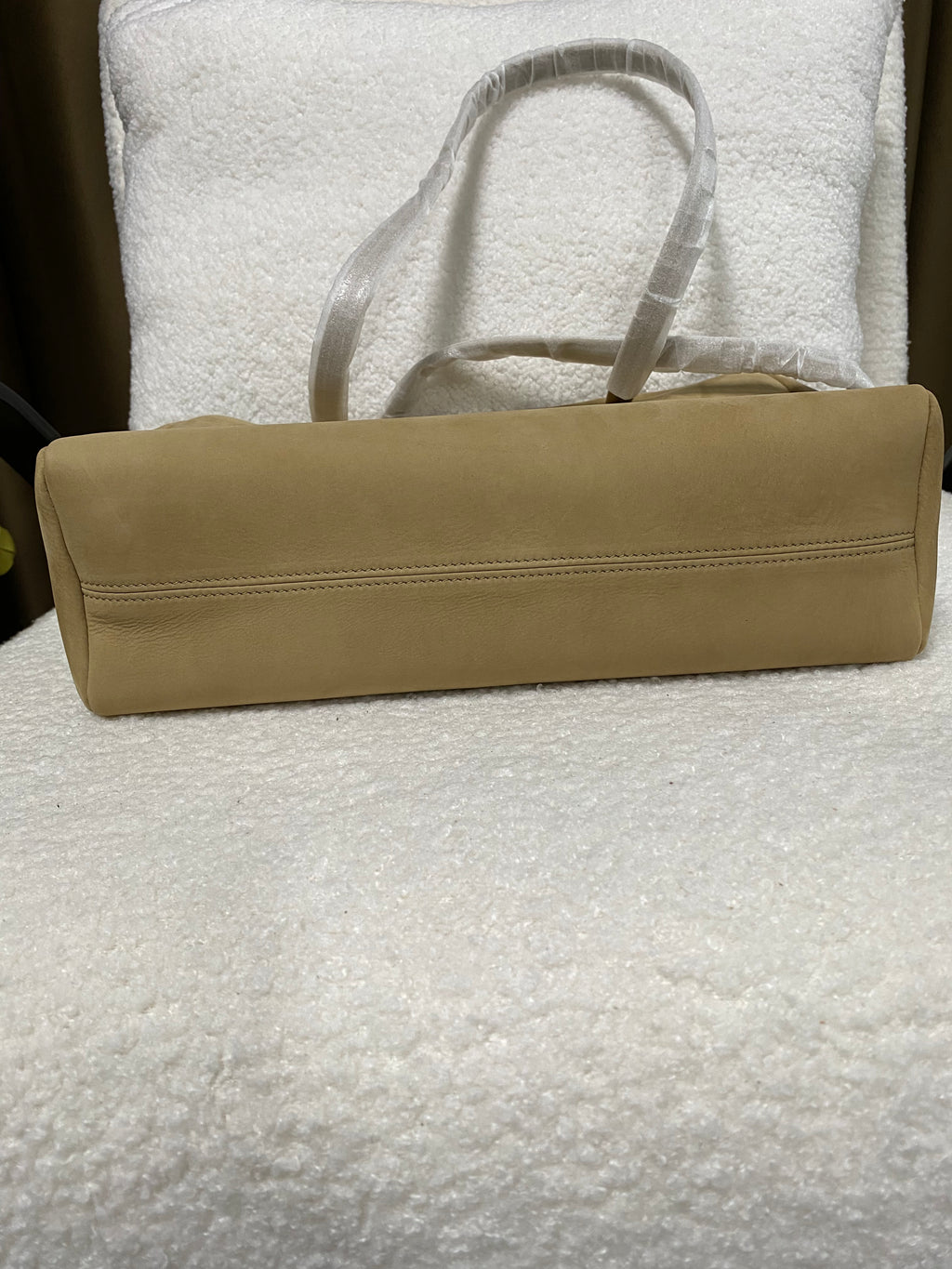 Flat leather base of camel baby calfskin Boston bag