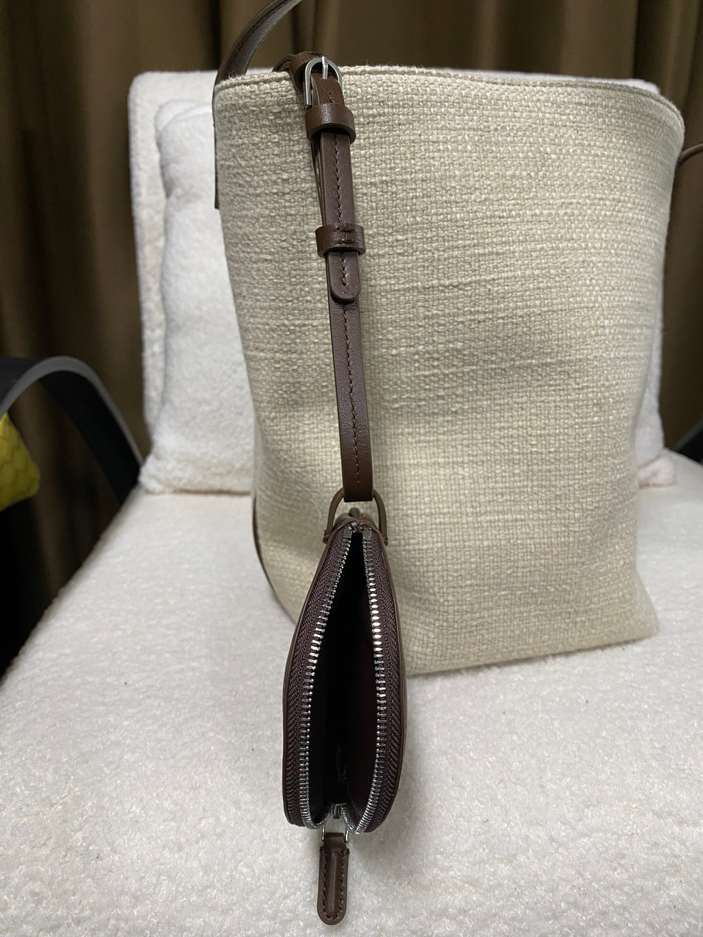 Linen bucket tote side profile with detachable leather pouch