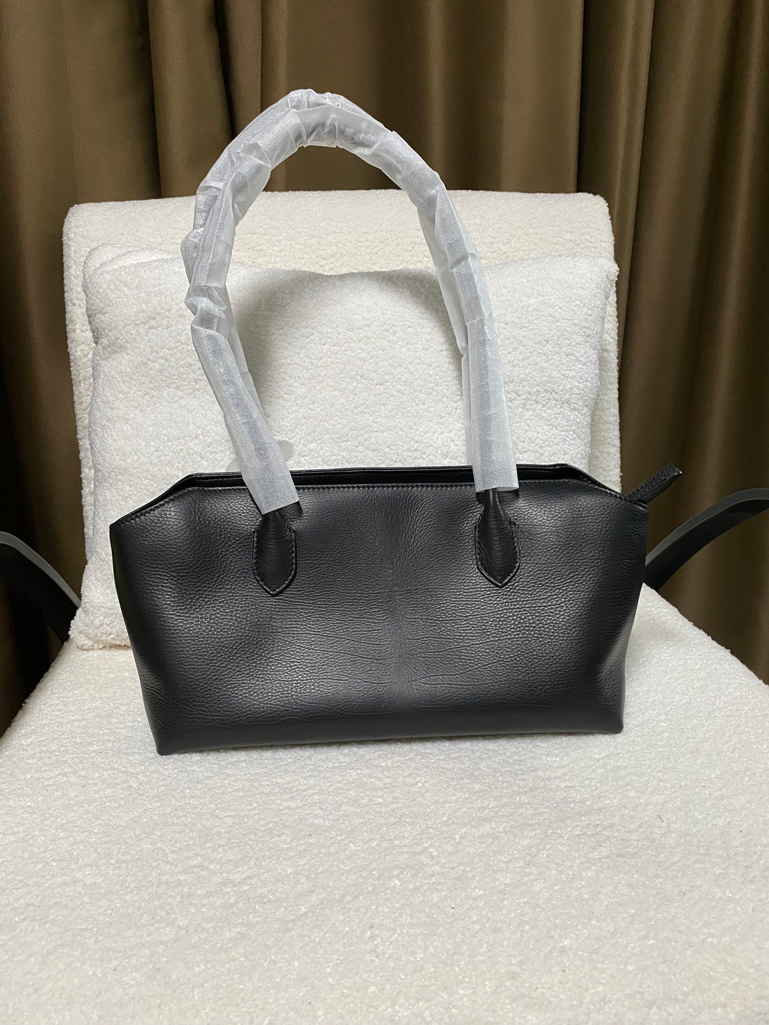 Black baby calfskin zip-top tote bag front view