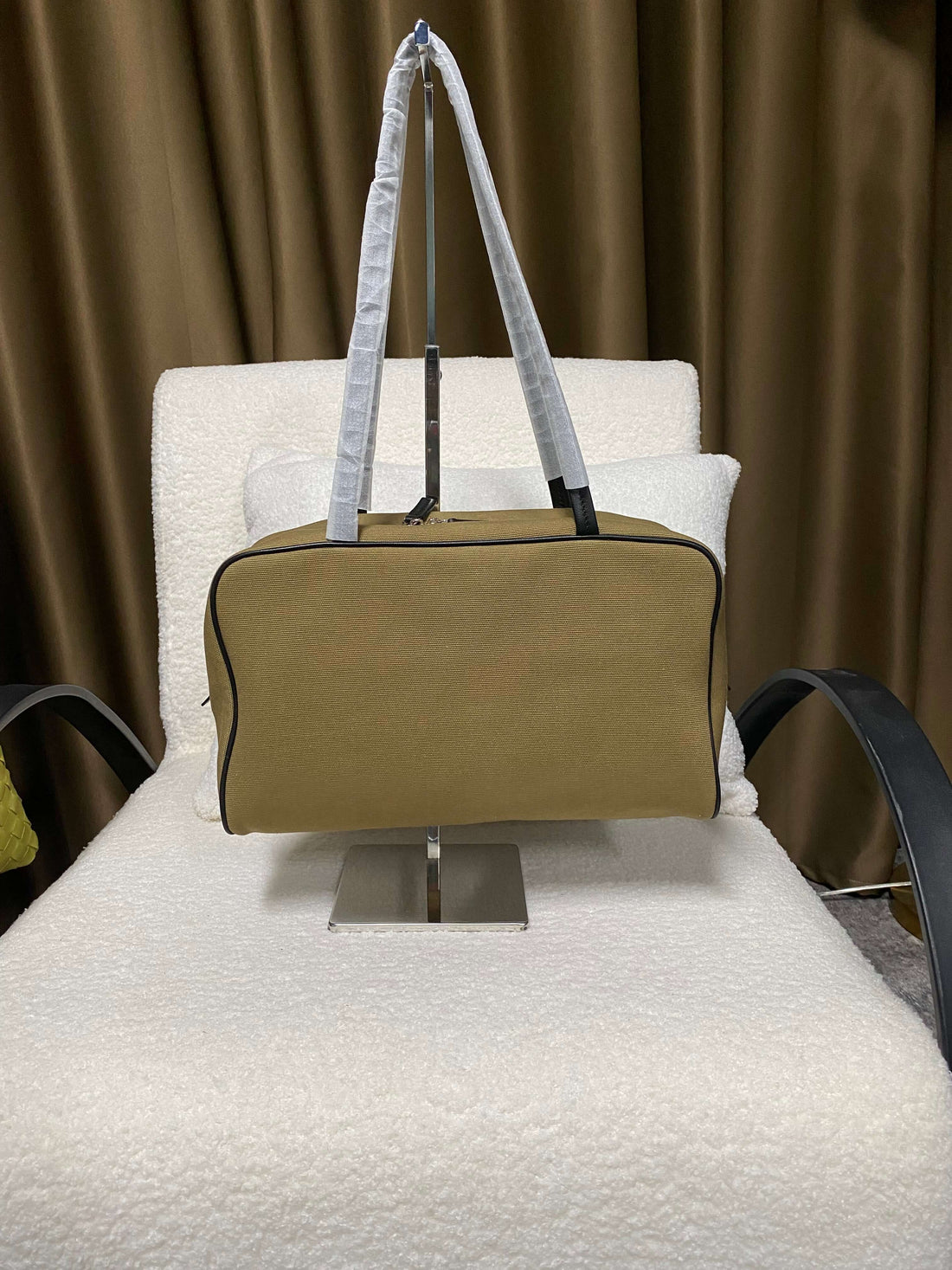 Logo-free canvas and lambskin commuter tote — olive green front view