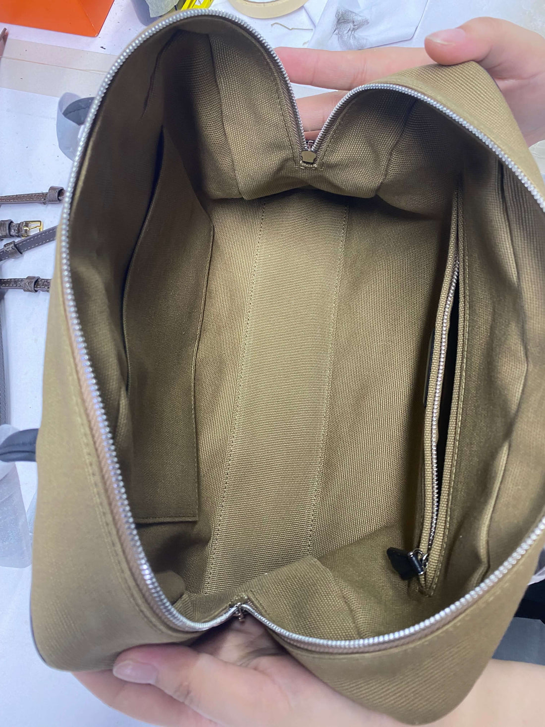 Logo-free canvas and lambskin commuter tote — open interior and soft canvas lining