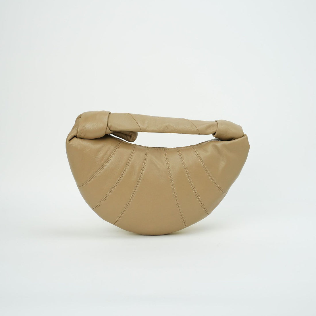Minimalist leather croissant bag quiet luxury