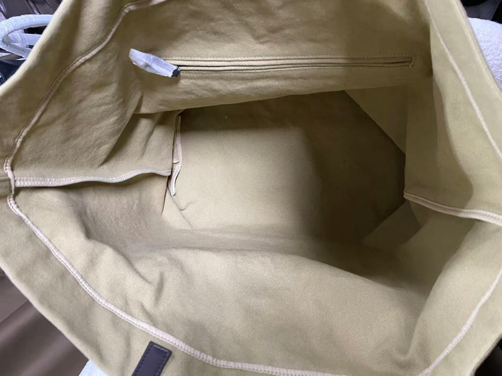 Open large-capacity interior of washed canvas tote
