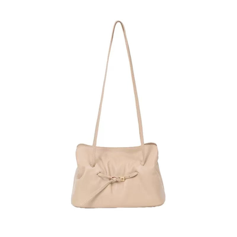 Black ruched lambskin crossbody bag — blush pink version front view