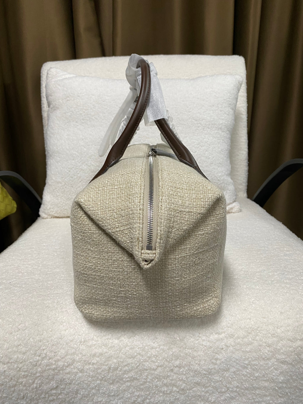 Linen Boston bag side profile with zip closure