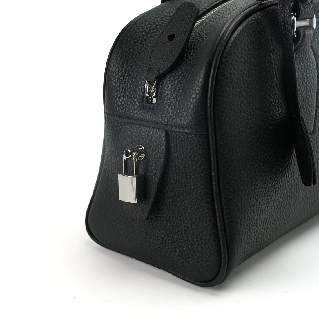Logo-free pebbled full-grain leather bowling bag — side panel and silver padlock close-up