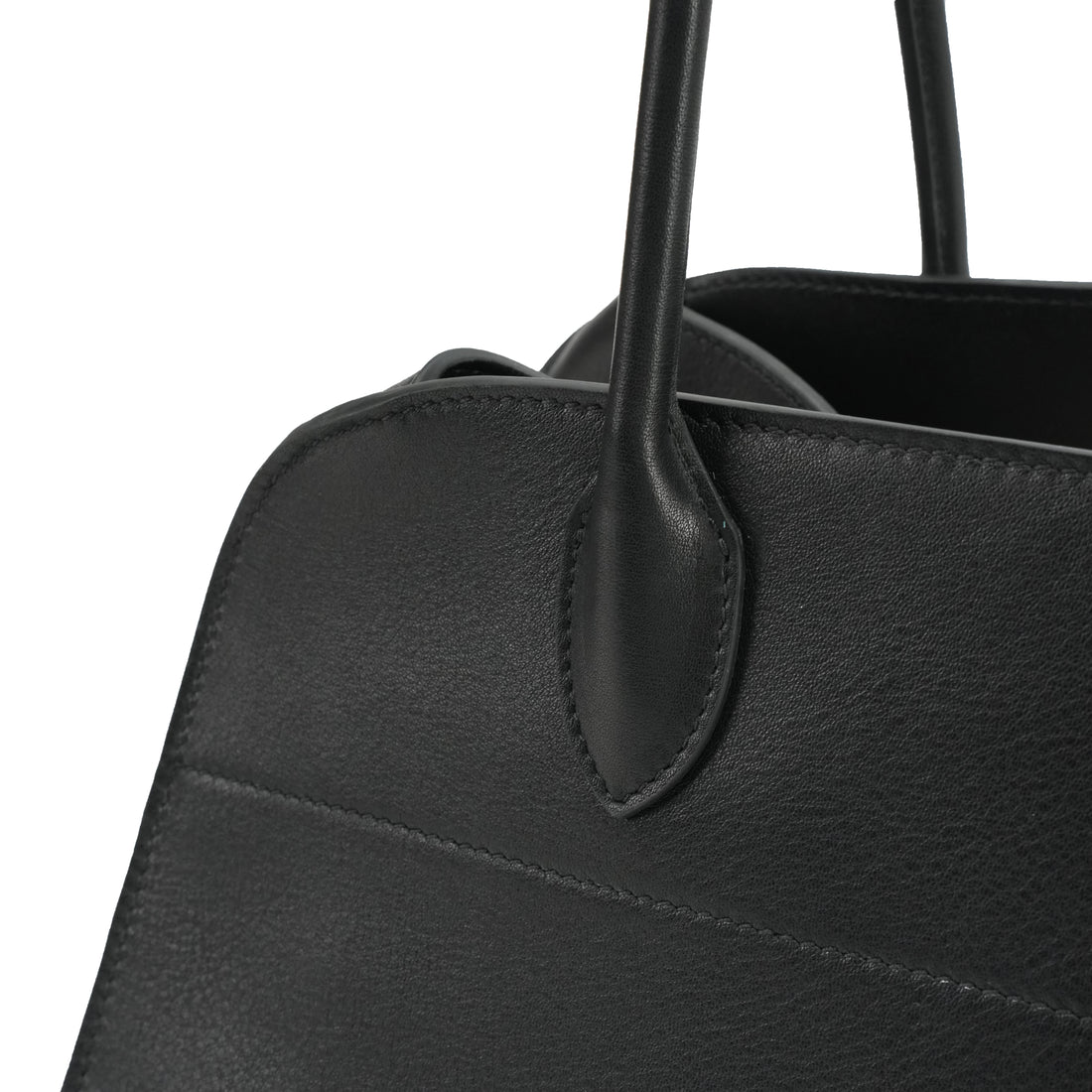 Minimalist black quiet luxury shoulder bag detail