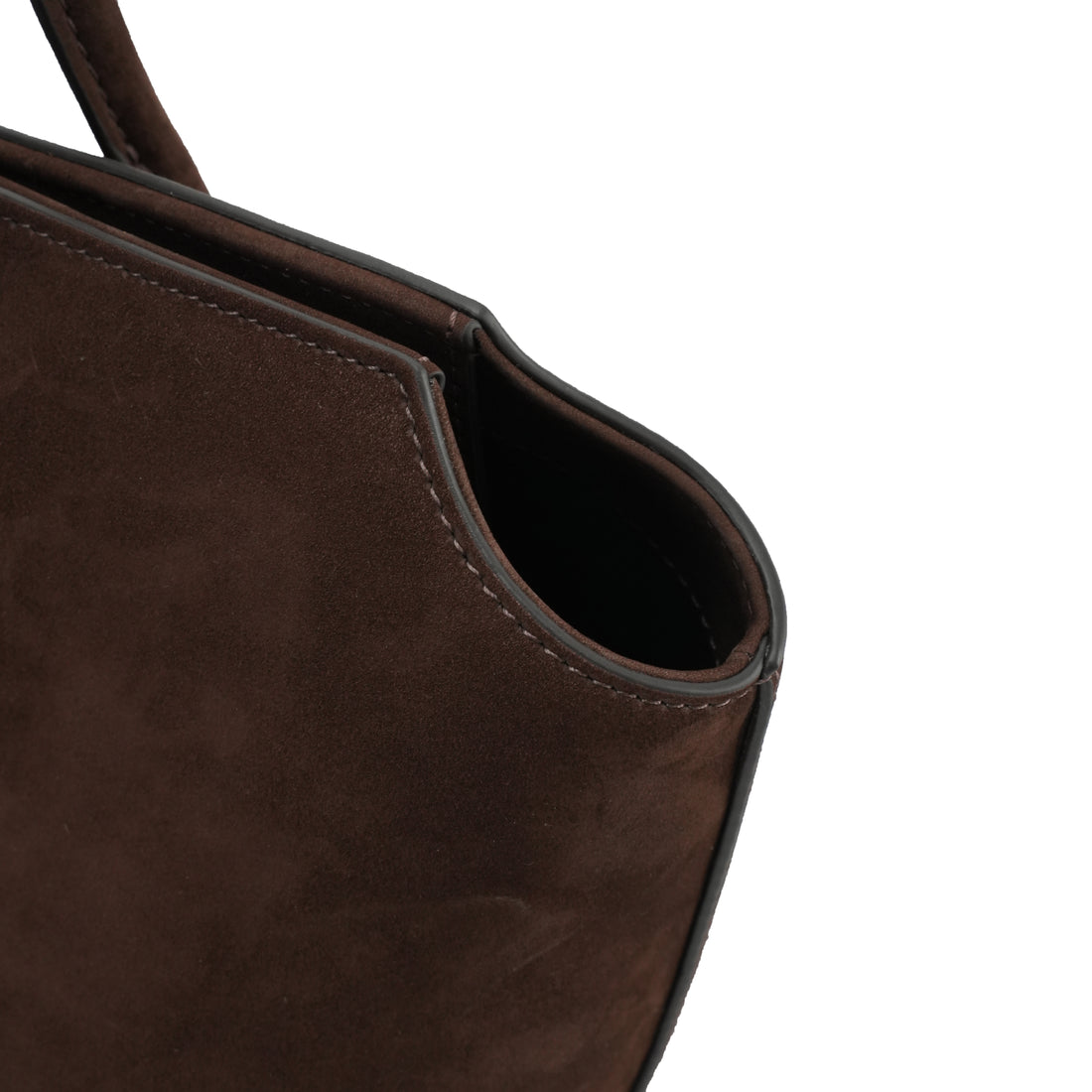 Logo-free full-grain cowhide shoulder tote — brown leather side opening close-up