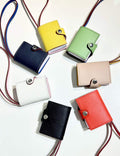 Hand-stitched first-layer leather book bag charm in seven colors